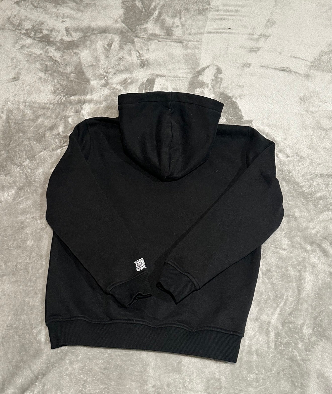 Black pull over MC hoodies