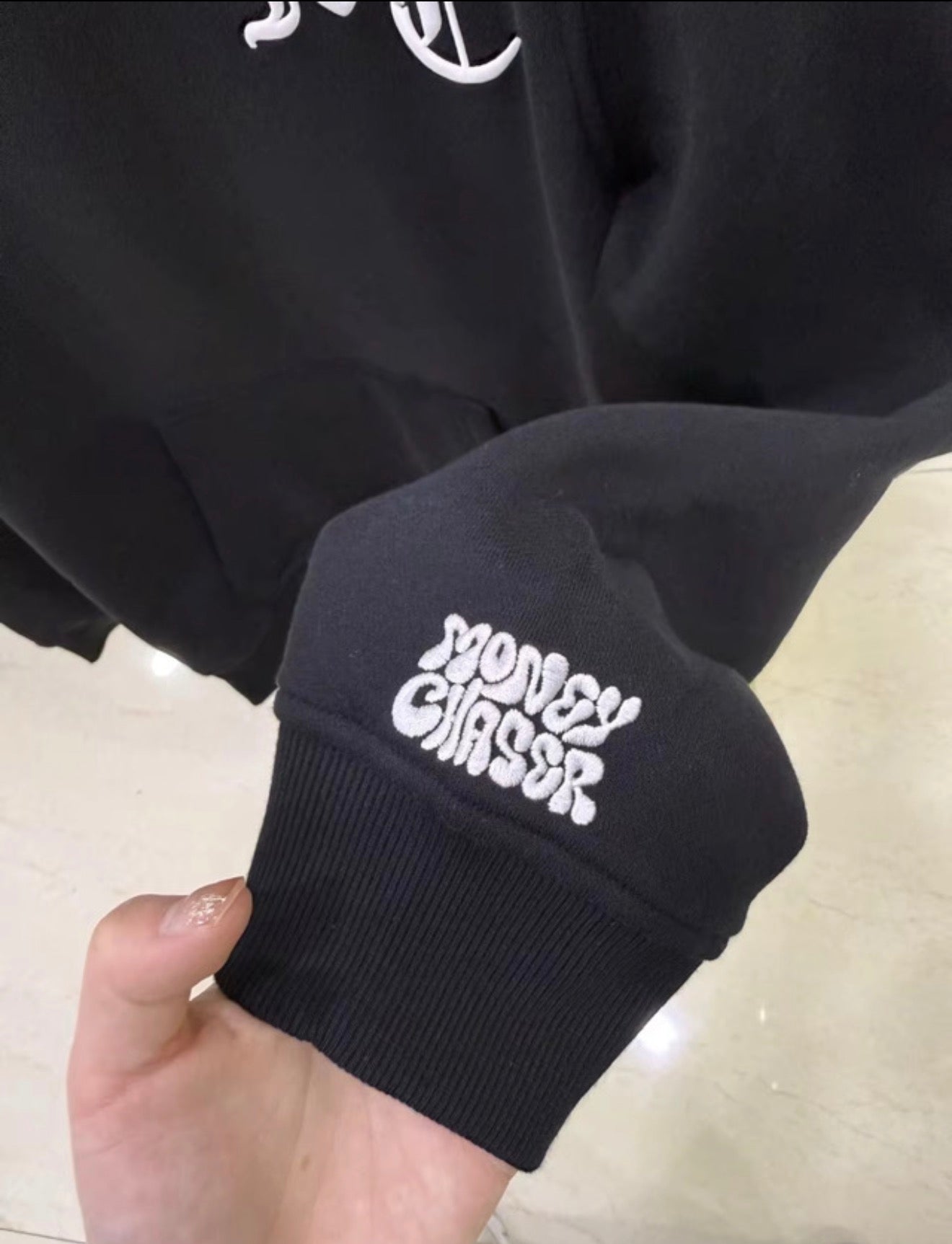 Black pull over MC hoodies